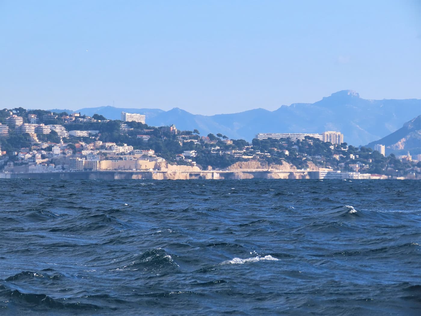The Corniche of Marseille along the bay, with the coast stretching west